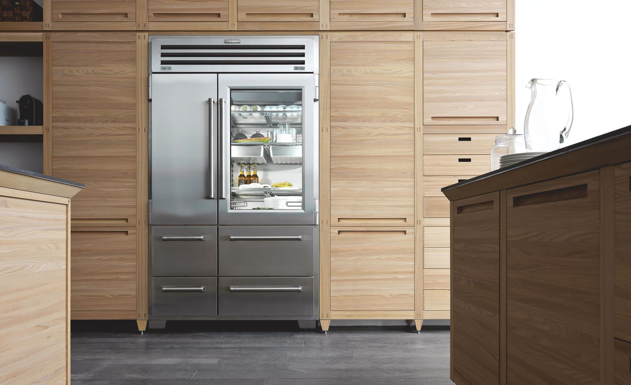 Sub-Zero built-in refrigerator in luxury Jacksonville kitchen — professional appliance repair